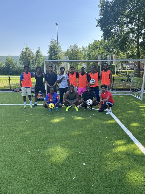 Voetbalgroep bij het doel